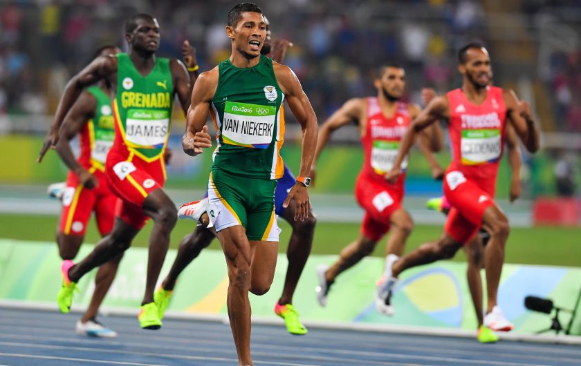 RIO DE JANEIRO, BRAZIL - AUGUST 14: Wayde van Niekerk of South Africa wins the mens 400m final and sets a new world record of 43.03 seconds during the evening session on Day 9 Athletics of the 2016 Rio Olympics at Olympic Stadium on August 14, 2016 in Rio