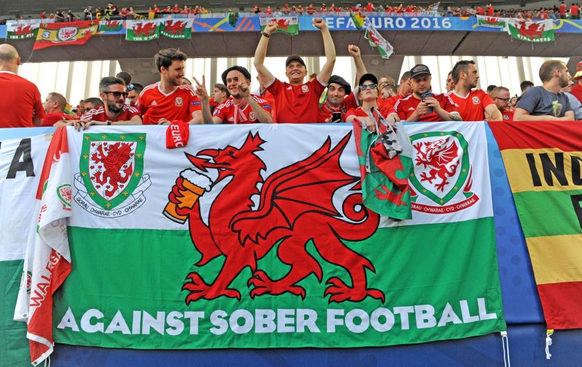Welsh football fans celebrate victory for Wales against Slovakia in their Euro 2016 Group B fixture at the Matmut Atlantique , Nouveau Stade de Bordeaux in Bordeaux, France on Saturday 11th June 2016.